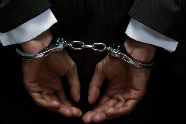 Illustrative photo of handcuffs (photo credit: ING IMAGE/ASAP)
