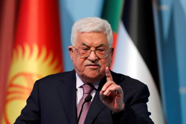 Palestinian Authority President Mahmoud Abbas speaks during a news conference following the extraordinary meeting of the Organisation of Islamic Cooperation (OIC) in Istanbul, Turkey (photo credit: REUTERS/OSMAN ORSAL)