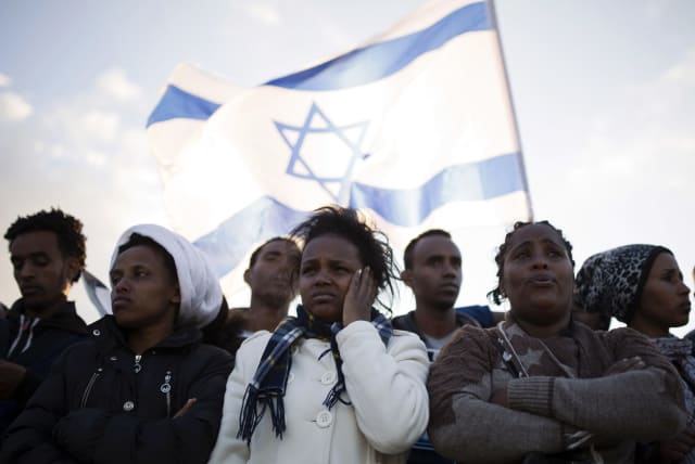 African migrants take part in a protest against Israel's detention policy toward them (photo credit: AMIR COHEN/REUTERS)