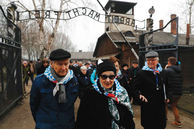 HOLOCAUST SURVIVORS visit the site of the Auschwitz death camp, during ceremonies marking the 73rd anniversary of the camp’s liberation and International Holocaust Victims Remembrance Day, in Poland in January 2018..