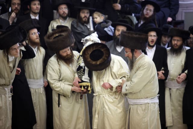 Rabbis dedicate a new torah scroll (photo credit: MARC ISRAEL SELLEM/THE JERUSALEM POST)