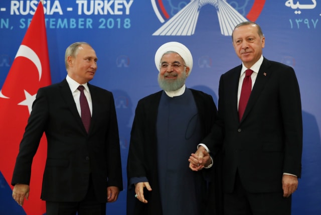 President Vladimir Putin of Russia, Hassan Rouhani of Iran and Tayyip Erdogan of Turkey meet in Tehran, Iran September 7, 2018. (photo credit: REUTERS)