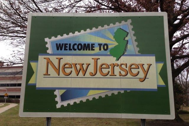 A 'Welcome to New Jersey' sign (photo credit: FAMARTIN/WIKIMEDIA COMMONS)