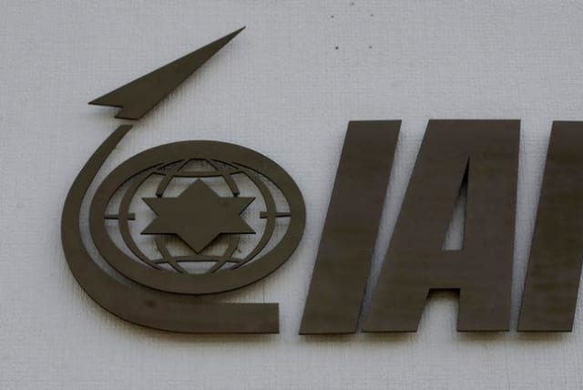 The logo of state-owned Israel Aerospace Industries (IAI), the country's biggest defence contractor, is seen at their offices next to Ben Gurion International airport, near Or Yehuda, Israel February 27, 2017. (photo credit: REUTERS/BAZ RATNER)