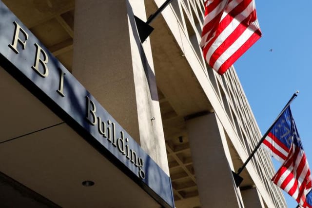 FBI headquarters building is seen in Washington, U.S., December 7, 2018 (photo credit: YURI GRIPAS/REUTERS)