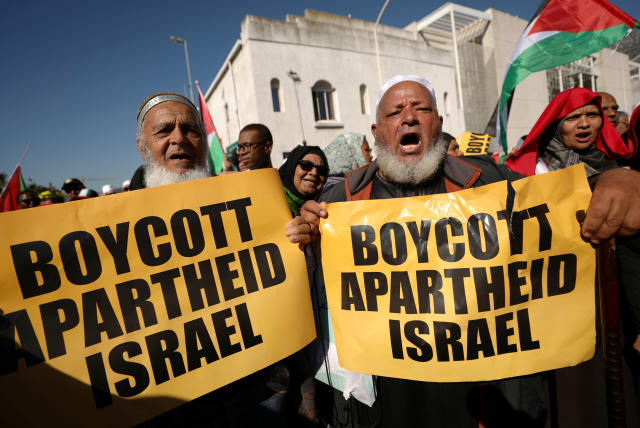 Protestors call for the severing of diplomatic ties with Israel during a march in Cape Town, South Africa. (photo credit: MIKE HUTCHINGS / REUTERS)