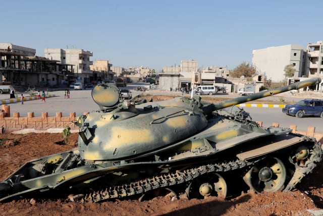 A Memorial in Kobani, Syria marks the site where an ISIS tank was destroyed in 2015 (photo credit: REUTERS)