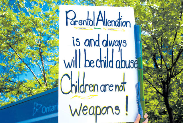 AT A family court protest in Ontario. (photo credit: EVAN DELSHAW/FLICKR)