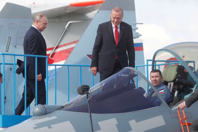 Russian President Vladimir Putin and Turkish President Recep Tayyip Erdogan inspect Sukhoi Su-57 fifth-generation fighter during the MAKS-2019 International Aviation and Space Salon in Zhukovsky outside Moscow, Russia, August 27, 2019. (photo credit: MAXIM SHIPENKOV/POOL VIA REUTERS/FILE PHOTO)