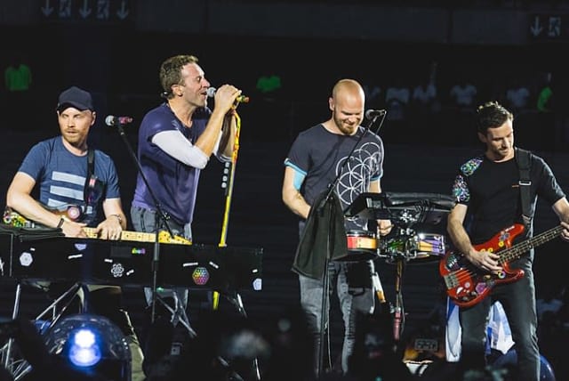 Coldplay in concert (photo credit: WIKIPEDIA)