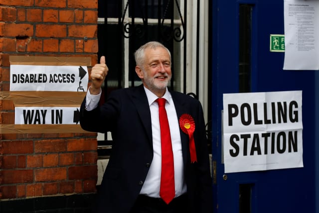 Jeremy Corbyn, leader of Britain's opposition Labour Party, arrives to vote in Islington, London, Britain June 8, 2017 (photo credit: STEFAN WERMUTH/REUTERS)