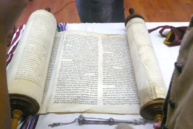 ‘HAVING CHOSEN God, the Torah is God’s response to us.’ Pictured: The Yanov Torah, rescued from the Holocaust. (photo credit: Wikimedia Commons)