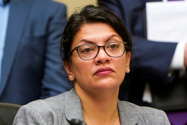 Rep. Rashida Tlaib (D-MI) listens as Acting Homeland Security Secretary Kevin McAleenan testifies before the House Oversight and Reform Committee on "Trump Administration's Child Separation Policy" on Capitol Hill in Washington, U.S., July 18, 2019 (photo credit: REUTERS/JOSHUA ROBERTS)