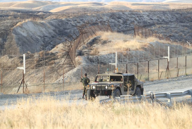 IDF soldiers keep guard in Jordan Valley earlier this year. Will Netanyahu annex the area?  (photo credit: AMMAR AWAD / REUTERS)