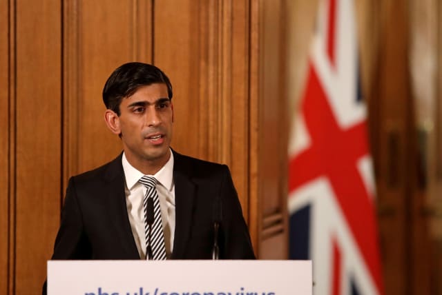 Then Chancellor of the Exchequer Rishi Sunak speaks during a news conference on the ongoing situation with the coronavirus disease (COVID-19) in London, Britain March 17, 2020. (photo credit: MATT DUNHAM/POOL VIA REUTERS)