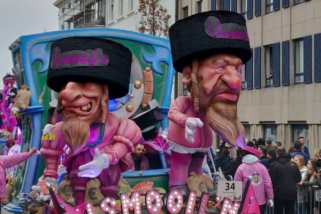 A float featuring antisemitic caricatures at the Aalst Carnival parade in Belgium on March 2 (photo credit: FJC)