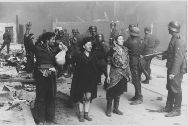 Jews held at gunpoint by Nazis during the Warsaw Ghetto Uprising. (photo credit: Wikimedia Commons)