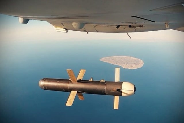 An Iranian Shahed 171 drone dropping a bomb as part of a military exercise in the Gulf, in Iran (photo credit: REUTERS)