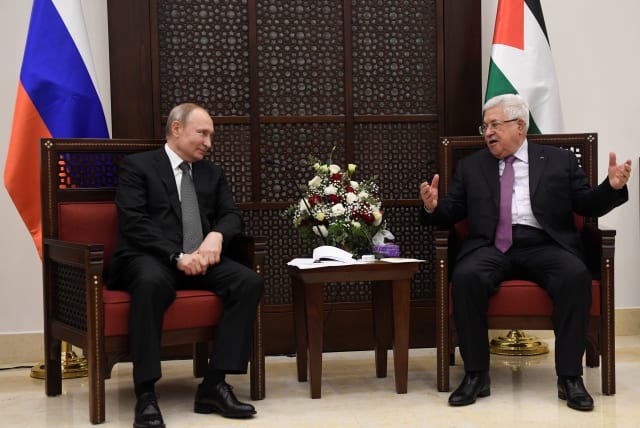 Russian President Vladimir Putin talks with Palestinian President Mahmud Abbas in the West Bank town of Bethlehem January 23, 2020 (photo credit: ALEXANDER NEMENOV/POOL VIA REUTERS)