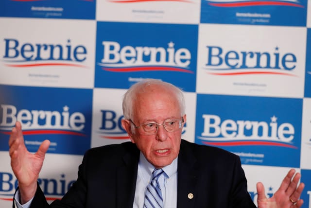 Bernie Sanders responds to a question from a reporter  (photo credit: LUCAS JACKSON / REUTERS)