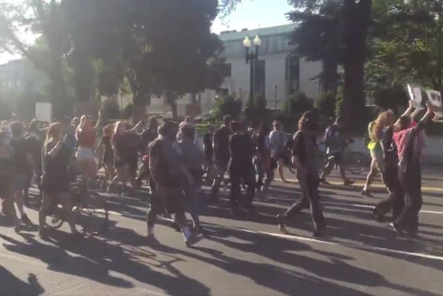 Protesters at a Black Lives Matter demonstration in Washington, D.C., July 1, 2020.  (photo credit: SCREEN SHOT FROM NIC ROWAN/TWITTER)