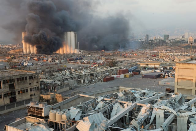 FILE PHOTO: Smoke rises from the site of an explosion in Beirut, Lebanon August 4, 2020 (photo credit: REUTERS/MOHAMED AZAKIR)