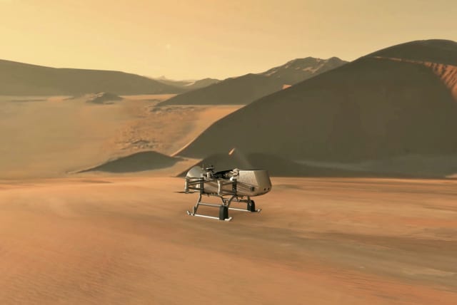 NASA's planned Dragonfly rotorcraft lander approaches a site to explore on Saturn's moon (photo credit: REUTERS)