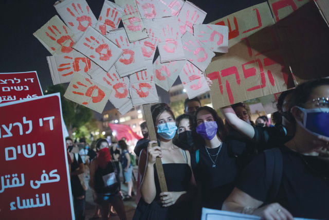 ACTIVISTS PROTEST against recent cases of violence against women at Habima Square in Tel Aviv last week. (photo credit: MIRIAM ALSTER/FLASH90)