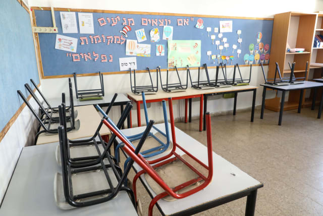 A school classroom is seen empty in Jerusalem's Beit Hakerem. (photo credit: MARC ISRAEL SELLEM/THE JERUSALEM POST)