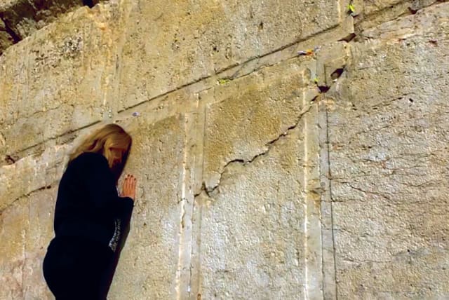 PRAYING AT the Western Wall – five years after first being approved, the Kotel Agreement remains suspended but not forgotten. (photo credit: Courtesy)