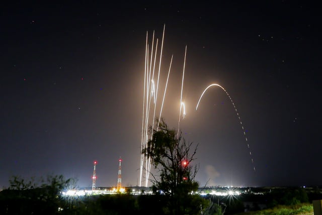 Rockets are seen being fired into Israel from the Gaza Strip, on May 12, 2021. (photo credit: EDI ISRAEL/FLASH90)