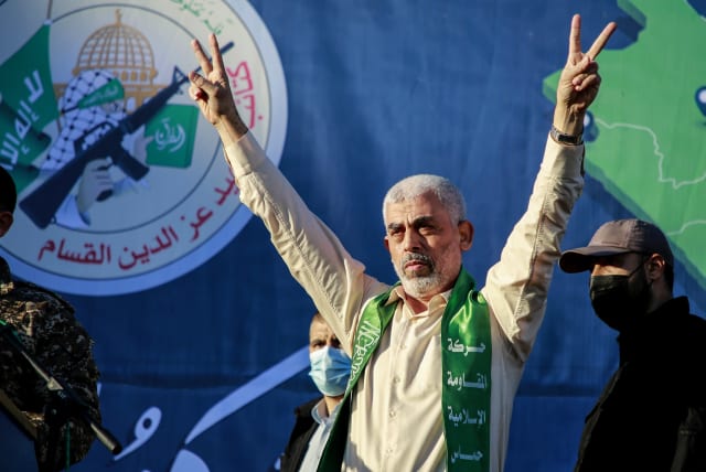YAHYA SINWAR, leader of Hamas in Gaza, gestures on stage during a rally in Gaza City on May 24 (photo credit: ATIA MOHAMMED/FLASH90)