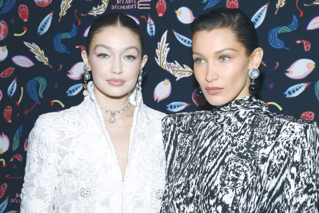 GIGI HADID and Bella Hadid attend the Harper’s Bazaar Exhibition last year in Paris. (photo credit: PASCAL LE SEGRETAIN/GETTY IMAGES/TNS)