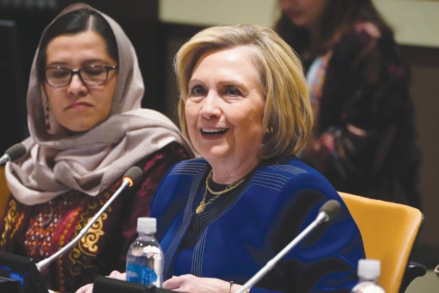 FORMER US secretary of state Hillary Clinton speaks about including women in the peace process in Afghanistan, at UN Headquarters in New York in March 2020. (photo credit: CARLO ALLEGRI/REUTERS)