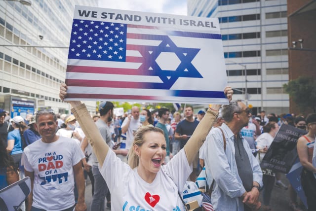 PRO-ISRAEL DEMONSTRATORS attend a rally denouncing antisemitism and antisemitic attacks, in Manhattan, last month.  (photo credit: ED JONES/AFP/GETTY IMAGES/TNS)