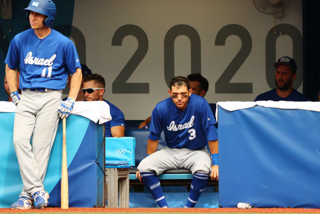 IT WAS a rough day for Team Israel in the Olympic baseball tournament, as the blue-and-white fell 11-1 to South Korea ahead of today’s duel with Dominican Republic. (photo credit: JORGE SILVA / REUTERS)