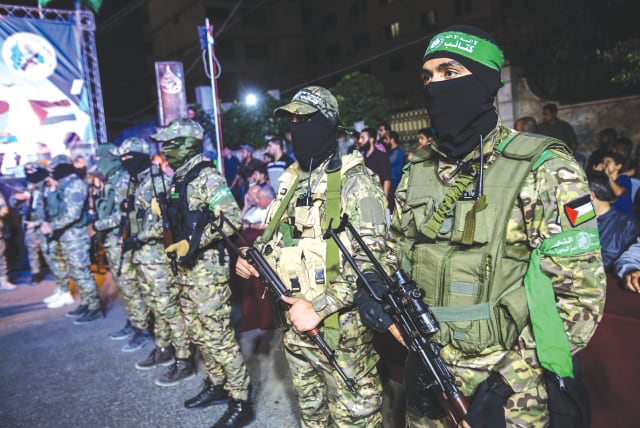  MEMBERS OF the Hamas Izzadin al-Qassam Brigades take part in a military event in Gaza City last week. (photo credit: ATIA MOHAMMED/FLASH90)