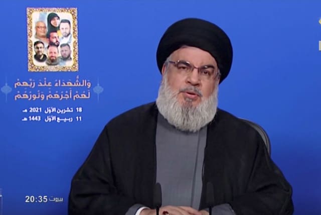  Lebanon's Hezbollah leader Sayyed Hassan Nasrallah gives a televised speech, in this screengrab taken from Al-Manar TV footage, Lebanon October 18, 2021. (photo credit: AL-MANAR TV/HANDOUT VIA REUTERS)