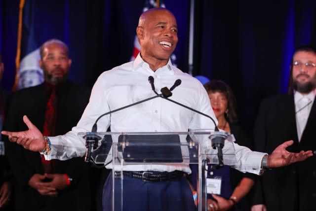  Democratic candidate for New York City Mayor Eric Adams reacts as he speaks after being declared victor at his election night party in Brooklyn, New York, US November 2, 2021. (photo credit: REUTERS/ANDREW KELLY)