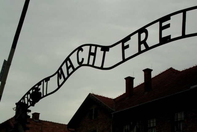  Entrance gate at Auschwitz concentration camp (photo credit: VIA WIKIMEDIA COMMONS)
