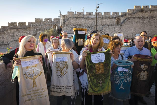 An egalitarian prayer service is led by the Women of the Wall near the Western Wall last month. (photo credit: OLIVIER FITOUSSI/FLASH90)