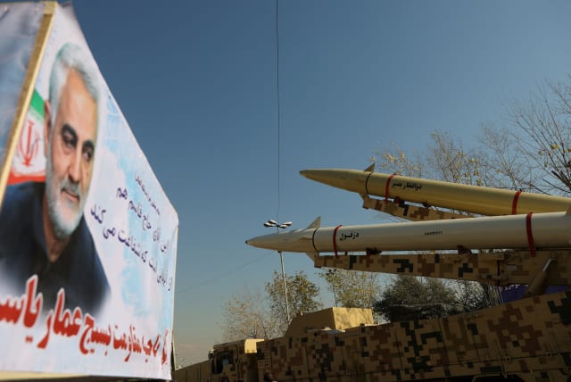  Missiles of the kind used during Iran's retaliatory strike on the U.S Ayn al-Asad military base in 2020 are seen on display at Imam Khomeini Grand Mosalla in Tehran, Iran January 7, 2022. (photo credit: MAJID ASGARIPOUR/WANA (WEST ASIA NEWS AGENCY) VIA REUTERS)