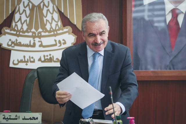  PA PRIME Minister Mohammad Shtayyeh attends a cabinet meeting. (photo credit: NASSER ISHTAYEH/FLASH90)