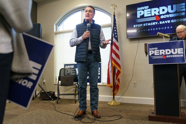 Former Republican US Senator David Perdue, who is primarying incumbent Brian Kemp for Georgia governor, speaks at a campaign event in Covington, Georgia, US, February 2, 2022. (photo credit: REUTERS/ELIJAH NOUVELAGE)