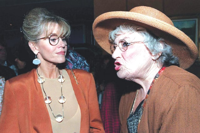  BELLA ABZUG wears her trademark large hat during a discussion with fellow activist Jane Fonda in 1995, at a function celebrating 20 years since the establishment of the United Nations Development Fund for Women (UNIFEM). (photo credit: REUTERS)