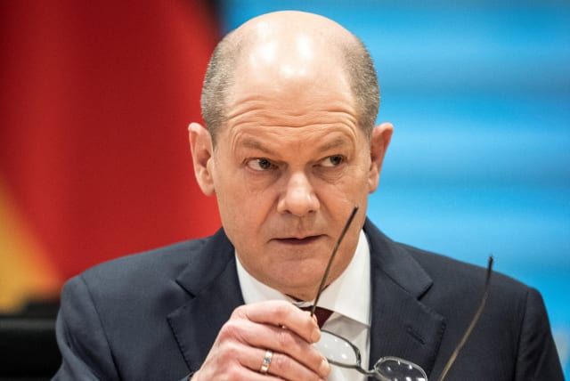  German Chancellor Olaf Scholz attends a meeting of the Federal security cabinet on the Ukraine crisis in Berlin, Germany, March 4, 2022. (photo credit: MICHAEL KAPPELER/POOL VIA REUTERS)