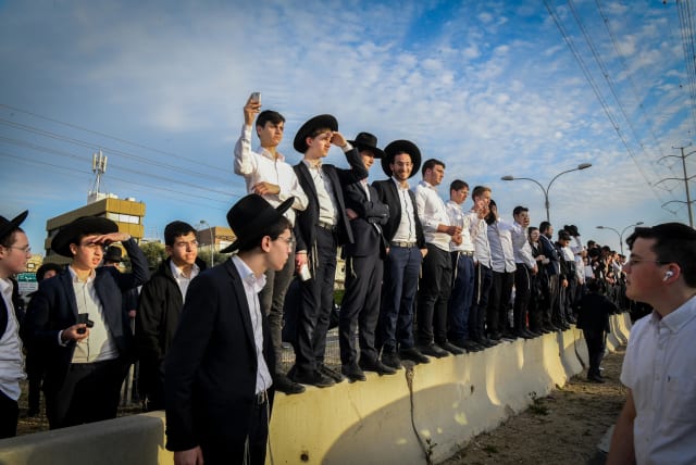  Ultra orthodox Jews protest against the arrest of ultra orthodox Jewish men who failed to comply with their army draft, in Bnei Brak, March 8, 2022. (photo credit: FLASH90)