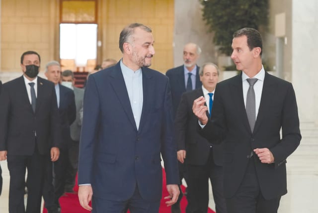  SYRIA’S PRESIDENT Bashar Assad meets with Iranian Foreign Minister Hossein Amirabdollahian in Damascus last year. Syria’s future looks to be in the hands of Assad. (photo credit: SANA/REUTERS)