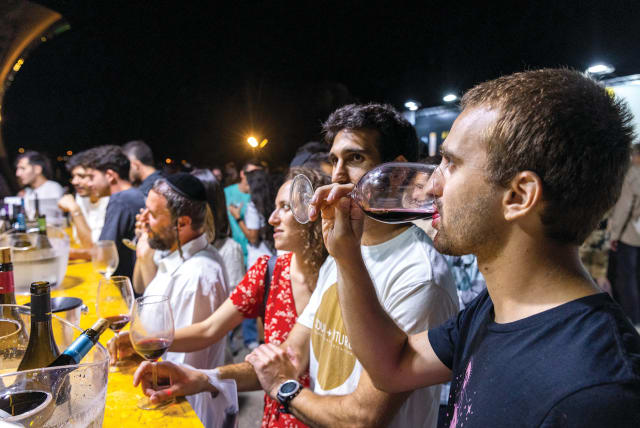  PARTICIPANTS TASTE samples at the annual Wine Festival at the Israel Museum in Jerusalem last summer. (photo credit: OLIVIER FITOUSSI/FLASH90)