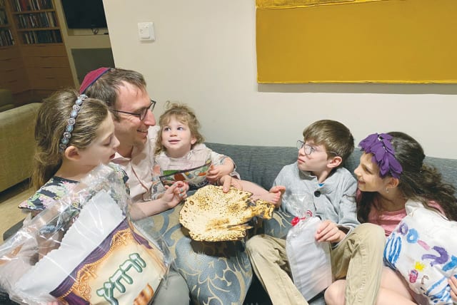  THE WRITER in Passover spirit with his children. (photo credit: BENJI LEVY)